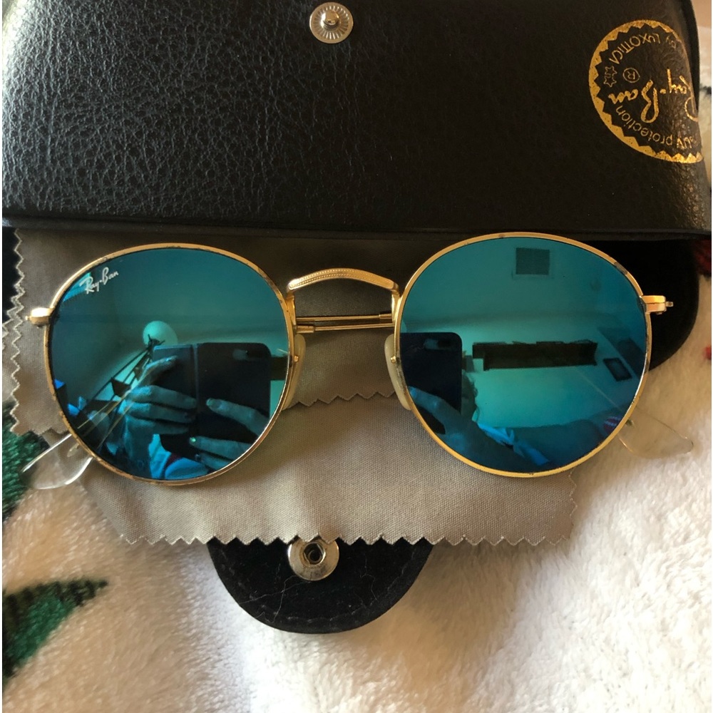 Ray Ban round blue glass with gold frame